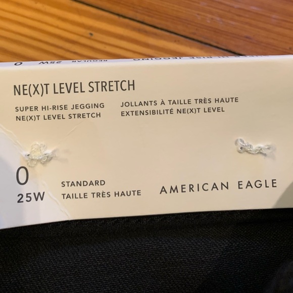 NWT! American Eagle Super Hi-Rise Distressed Denim Jegging 
Black Size 0 - Picture 11 of 13